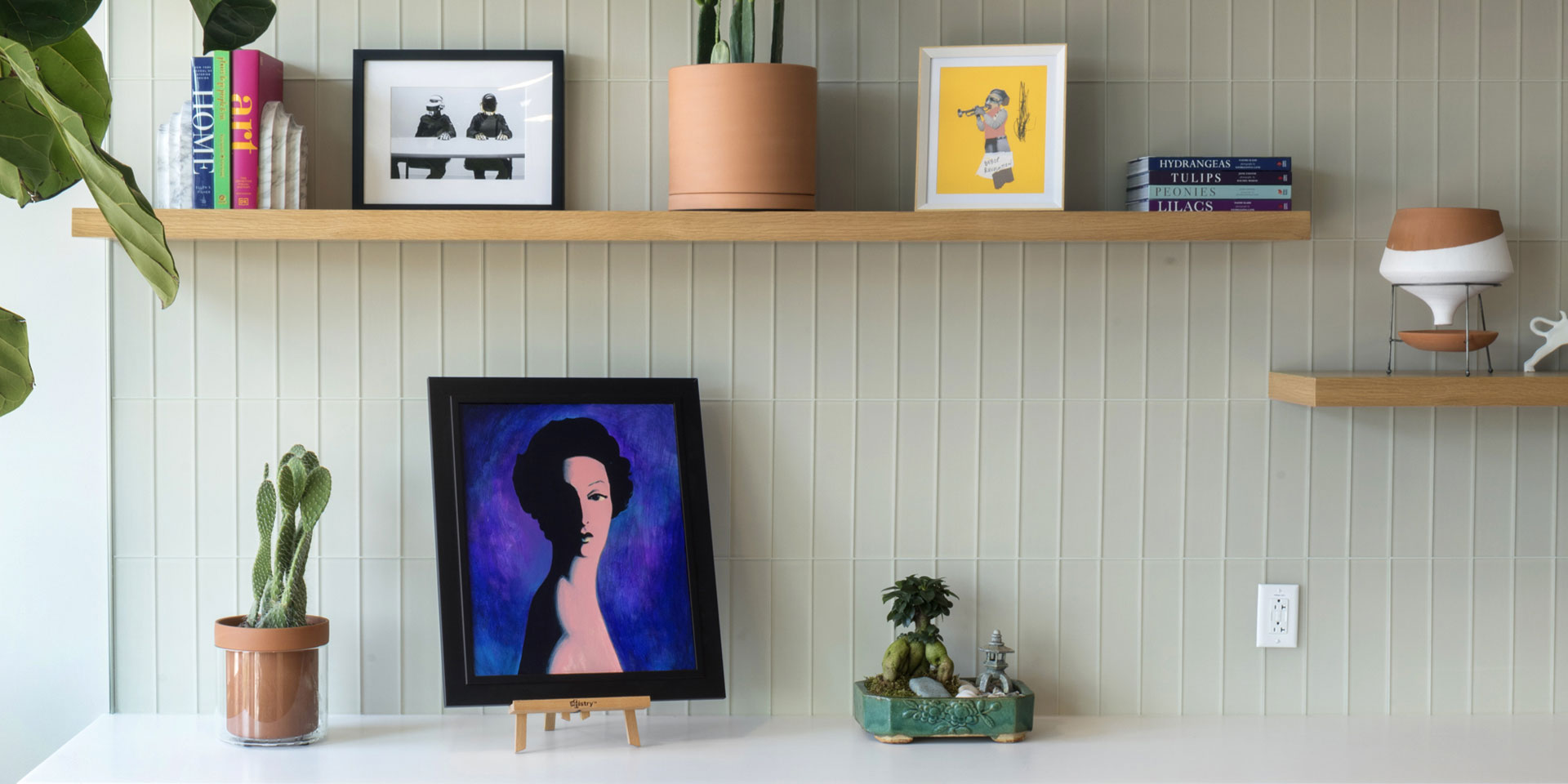 Modern interior with built-in shelving and artwork