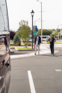 Pedestrians walking through a landscaped town center